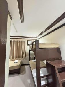 Ένα ή περισσότερα κρεβάτια σε δωμάτιο στο Sonly Hotel