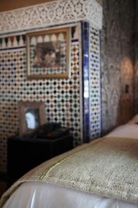 Ένα ή περισσότερα κρεβάτια σε δωμάτιο στο L'Alcazar