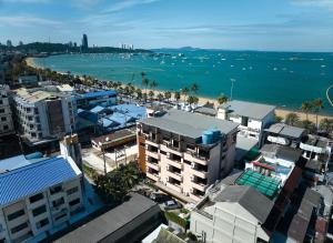 an aerial view of a city with a beach and buildings at The Weekend Pattaya (Tweet Tweet Nest Pattaya) in Pattaya