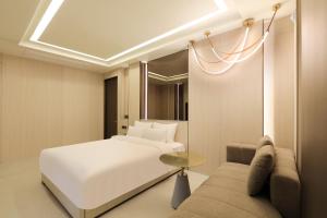 호텔 퀸스 객실 침대