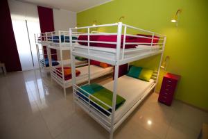 Postel nebo postele na pokoji v ubytování Sicily Rooms Enna