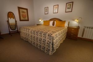 Cama ou camas em um quarto em Hotel Kosten Aike