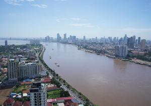 an aerial view of a river in a city at Urban Sanctuary Riva Phnom Penh in Phnom Penh
