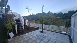 a balcony with a view of a mountain at Sangkuriang 2 - Private Dome in Bandung