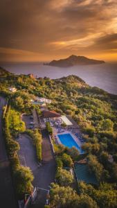 an aerial view of a resort with a swimming pool at Gocce Di Capri Resort in Massa Lubrense +179 photos