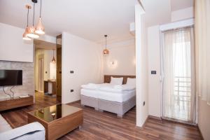 Postel nebo postele na pokoji v ubytování Hotel Vlaho + 37 fotografií