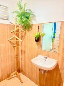 a bathroom with a sink and a mirror at Kohmook sunrise beach in Ko Muk +183 photos