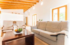 a living room with a couch and a table at Pedra Viva in Son Servera +39 photos