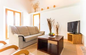 a living room with a couch and a coffee table at Pedra Viva in Son Servera