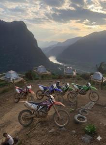 a group of motorcycles parked on top of a mountain at Papae viewpoint with camping in Ban Ngoy-Nua