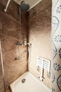 a shower in a bathroom with a bath tub at 2Stay Porto in Porto
