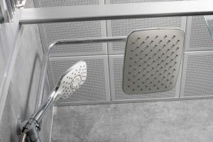 a spatula in the corner of a shower at De Bonte in Istanbul +25 photos