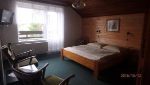 Postel nebo postele na pokoji v ubytování Dům Jaroslava + 17 fotografií