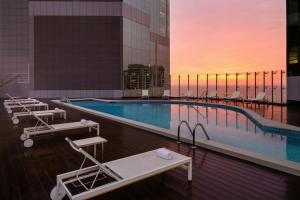 a swimming pool on the top of a building at JW Marriott Hotel Lima in Lima