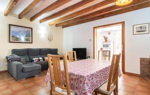 a living room with a table and a couch at C'as Pobres in Sóller +37 photos