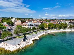 an aerial view of a river in a city at Hotel Aurora in Desenzano del Garda