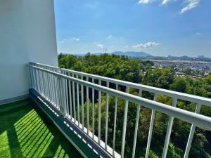 a balcony with a view of a city at Almyra cozy condo in Kajang