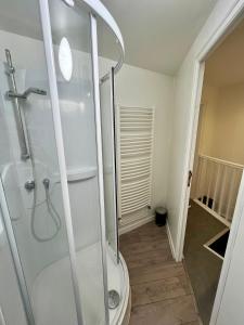 a bathroom with a shower and a toilet at L'escale Barbieux in Croix +27 photos