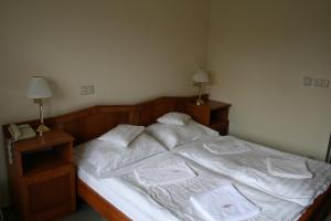 Postel nebo postele na pokoji v ubytování Well Hotel