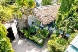 an aerial view of a house with trees and plants at Cosy Garner Haven Watamu in Watamu