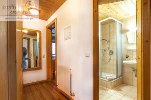 a bathroom with a shower and a sink at Apart Furcletta in Ischgl +63 photos