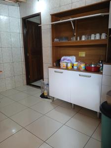 a kitchen with a counter with some food on it at Férias da Hora in Prado