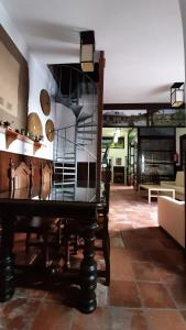 a dining room with a table and some chairs at APARTAMENTO La CAVA in Guadalcanal