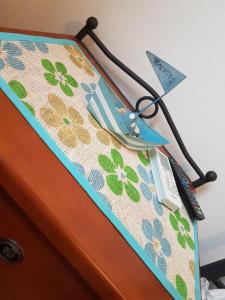 a close up of a bed with a table with a knife at Dimitreli Beach House in Telendos +23 photos
