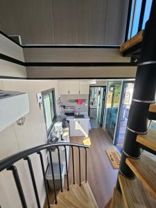 a view of a living room and kitchen in a house at Halte aux randonneurs in La Possession