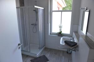 Ванна кімната в Gästehaus Thuine