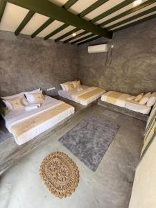 an overhead view of a room with two beds at Wanora Eco Villa in Dickwella +43 photos