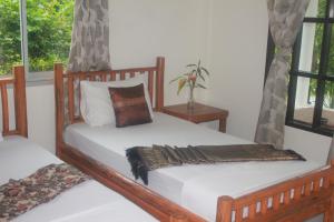 Кровать или кровати в номере Privacy Resort - Koh Chang
