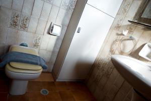 a bathroom with a toilet and a sink at Best House Penelope Neo Faliro Piraeus in Piraeus +18 photos