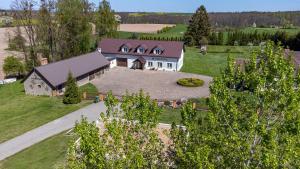 an aerial view of a house with a large driveway at Halinówka Goniądz in Goniadz