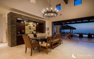a dining room with a table and chairs at Puerto Los Cabos Villa - Infinity Pool & Hot Tub in San José del Cabo