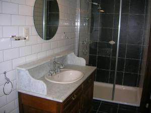 a bathroom with a sink and a shower at Ferme du Charme in Moustier +51 photos