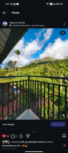 a picture of a balcony with a view of a mountain at Hang on in Anachal