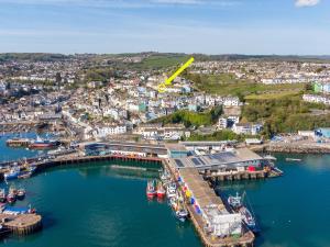 an aerial view of a harbor with boats in the water at Seagulls View in Brixham