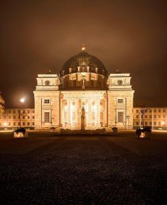 a large building with a domed building at night at Gemütliche Unterkunft Sankt Blasien in St. Blasien