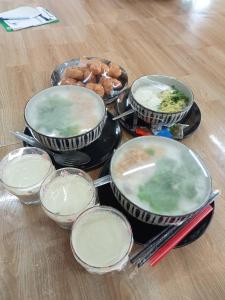 a group of bowls of food sitting on a table at Nordic pool villa huahin6 in HHQ