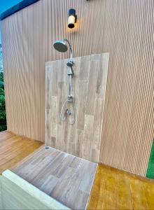 a shower in a building with a light at Nordic pool villa huahin6 in HHQ