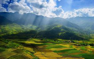 a view of a valley with mountains in the background at Easy Ha Giang in Làng Lap