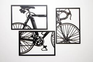 two framed illustrations of a bike at Afan House by STAE-Homes in Glyncorrwg