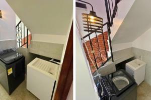 a bathroom with a washer and dryer and a staircase at Edificio Casa Anita in Medellín