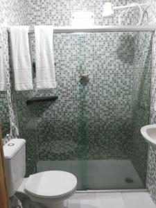 Ванная комната в Casa folha verde
