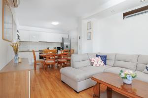 a living room with a couch and a table at Apartment Bernarda in Igrane