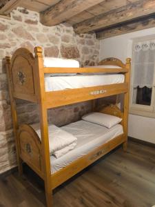 Llit o llits en una habitació de La Coccola di Camporovere