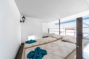 A bed or beds in a room at D53 Apartments