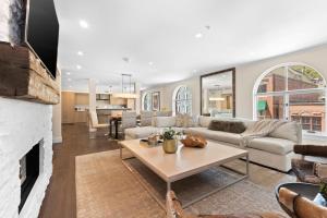 a living room with a couch and a table at Abode at Sky Silver in Park City