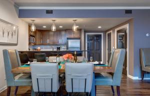 a kitchen and dining room with a table and chairs at Abode on Lower Main Street in Park City